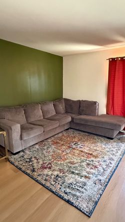 $200 must go today! Gray Sectional Sofa with Chaise and Queen pull out bed