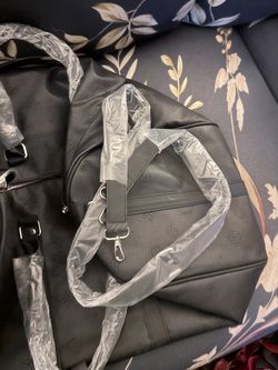 Black Monogram Embossed Duffle Bag