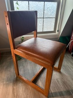 OBO Two chairs Wood and faux leather + orange chairs must go