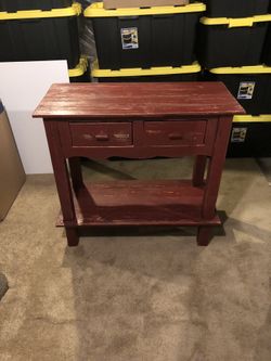 Wooden table with drawers