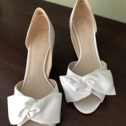 White Satin 2 1/2 inch heel. Size 8 1/2. $60 New !