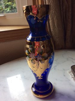 Blue and gold vase with flowers beautiful