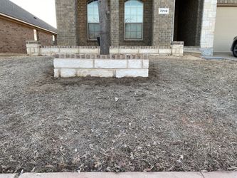 STONE WORK/FLOWER BEDS