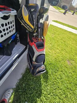 Golf bags and clubs