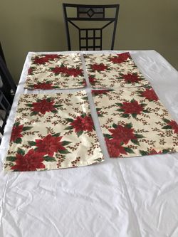 4 poinsettia placemats.