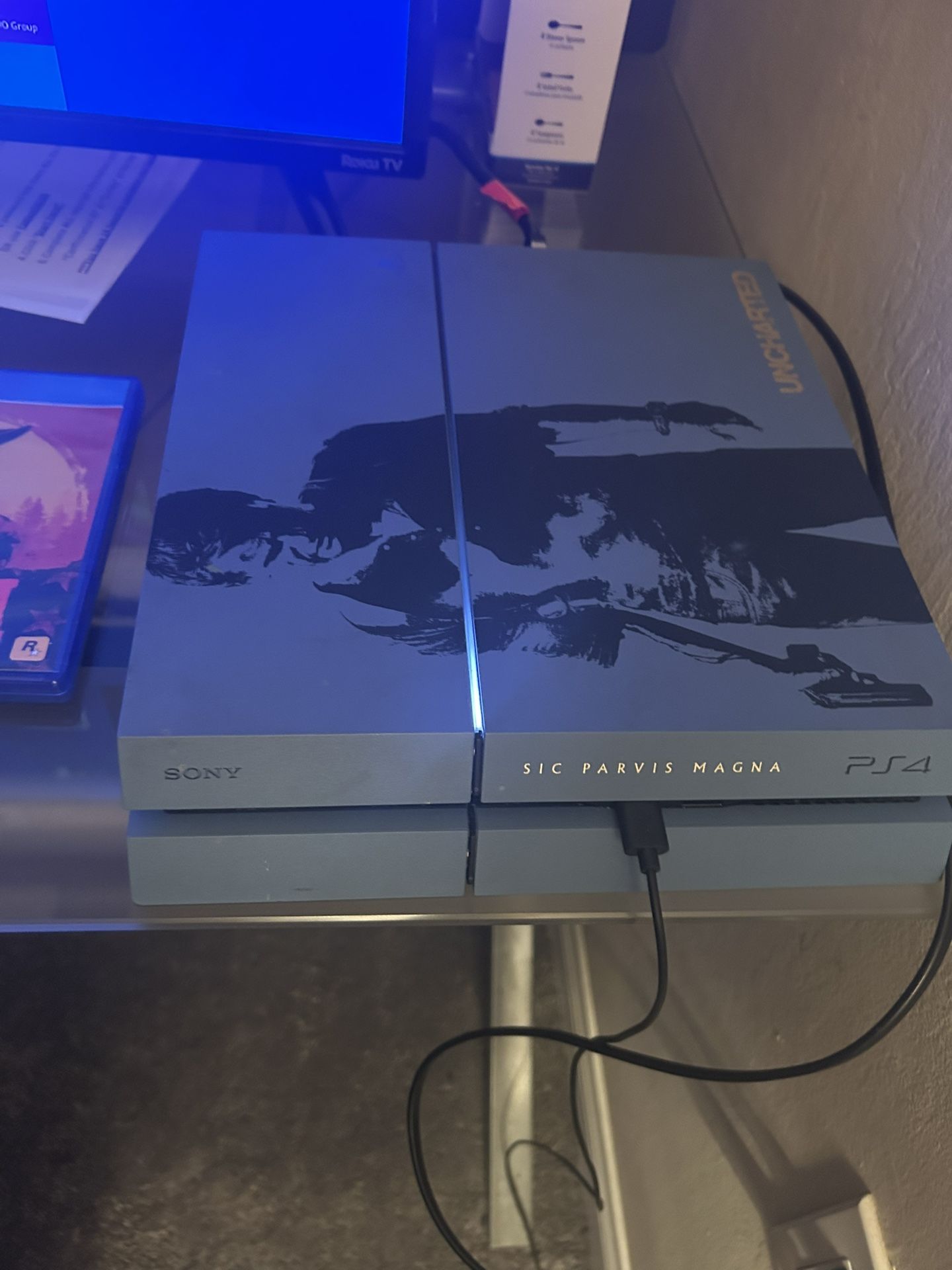 PS4 500GB + Controller & 2 Games