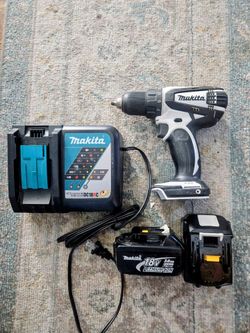Makita drill, charger, and two 18v 3ah batteries. Like new.