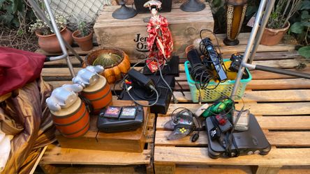 Huge lot of various game consoles.