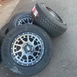 17x9 Rims And Tires 245/65/17 AT