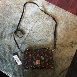 Dooney and Bourke All Weather Wallet on a string