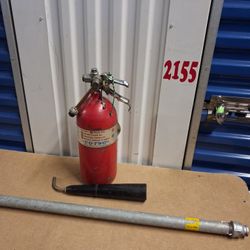 5lb  CO2 FIRE IS EXTINGUISHER, SET UP FOR POWER LINE FISHING