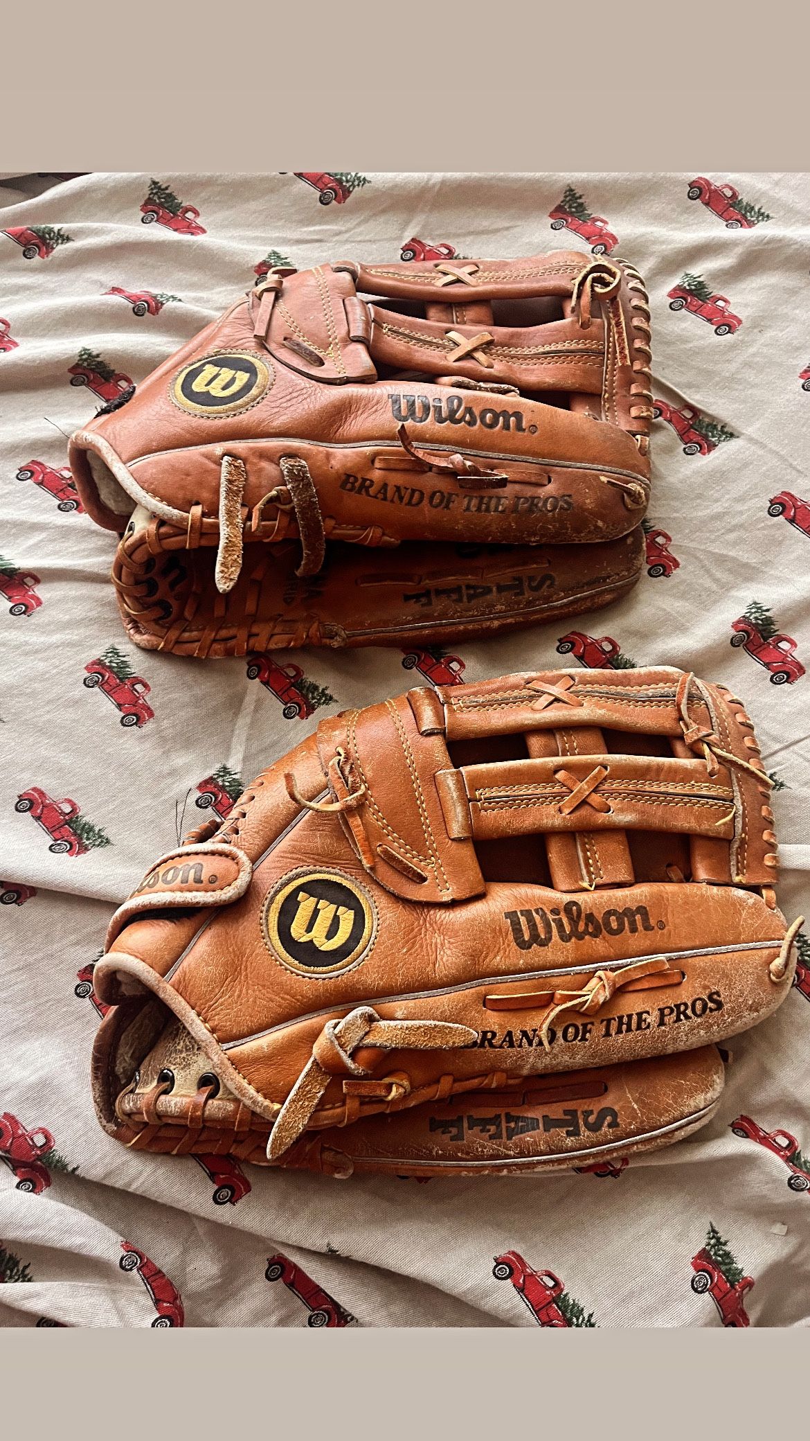 pair of baseball Gloves