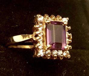 14 karat yellow gold woman’s Emerald cut amethyst and diamond ring