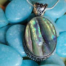 ANOTHER NATURAL BEAUTY FROM OUR SEAS. ABALONE STERLING/18" STERLING SILVER, CHAIN