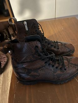Jimmy Choo x Kaia K-CRUZ — the brown/black snake-effect leather combat boot from the 2020 Jimmy Choo & Kaia Gerber capsule collection.