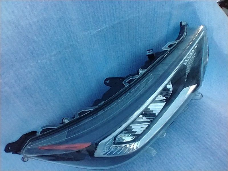 Passenger Side Headlight Possibly Honda