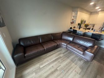 Brown leather sectional sofa