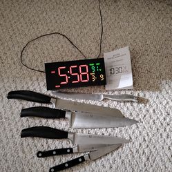 Clock plus kitchen utensils