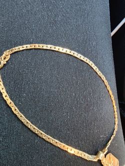 14k gold bracelet and pendant (5g)$700 obo