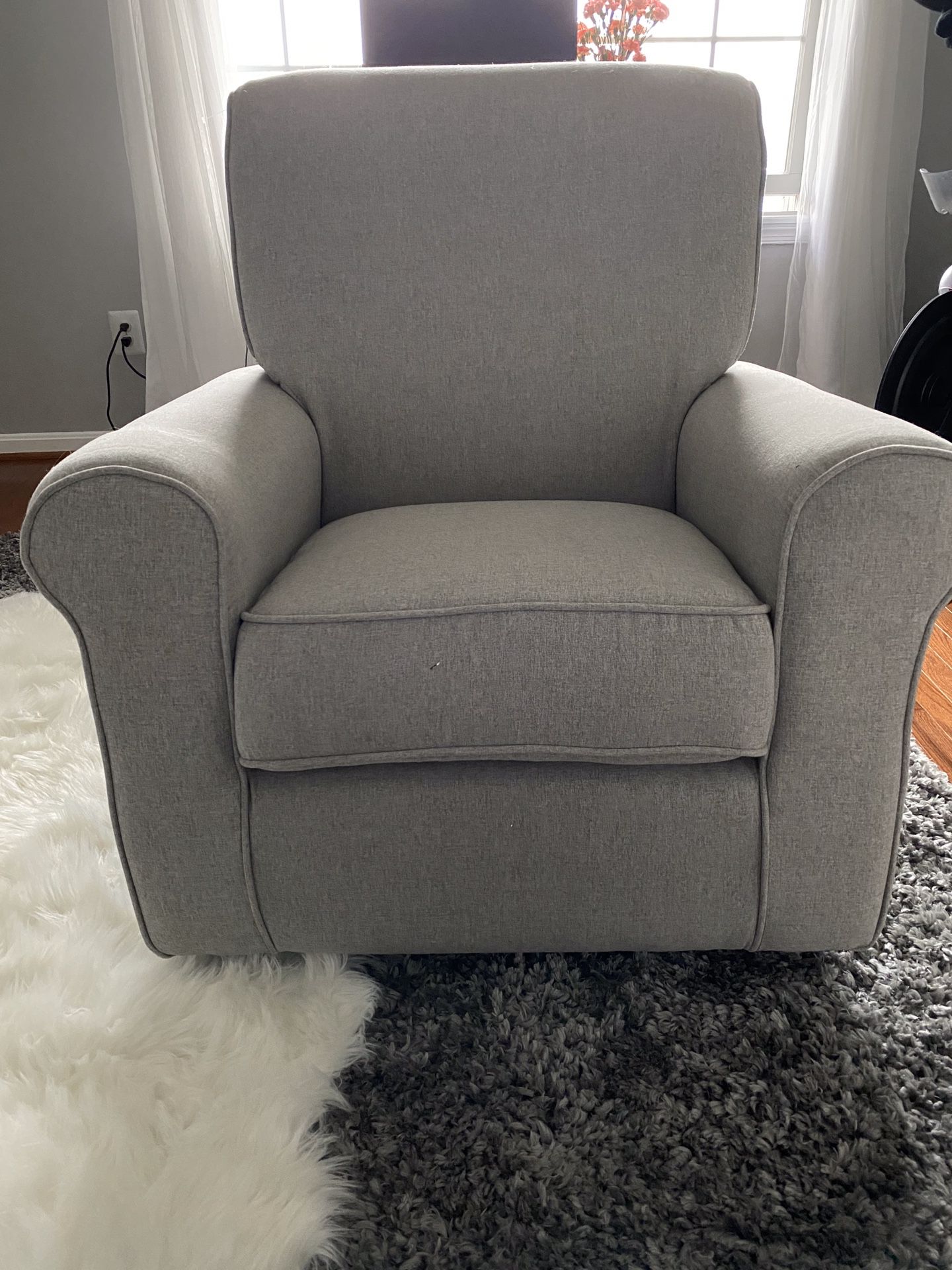 Brand new upholstered glider chair