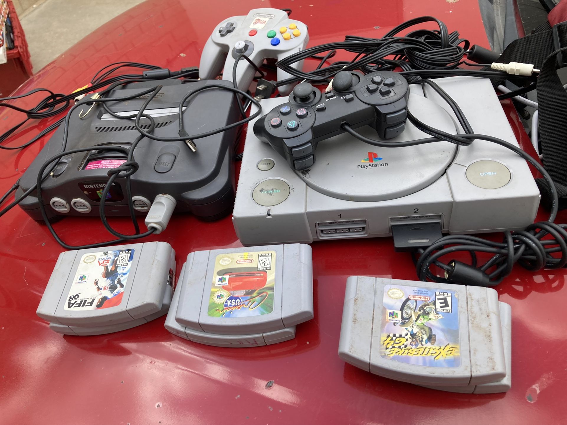 Nintendo And PlayStation With Games And All You See