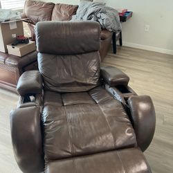 Leather Recliner With Cop Holders And Arm Storage Slots