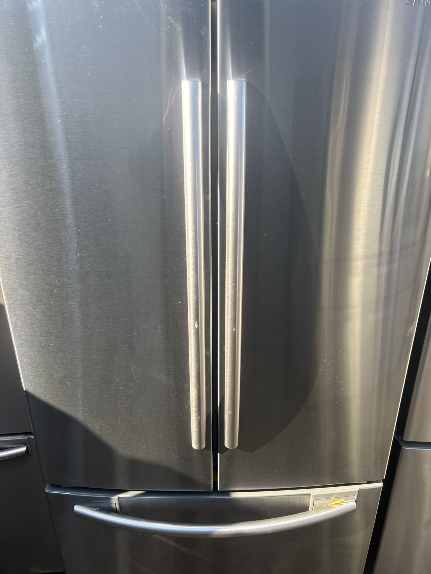 33 inch wide French door refrigerator brand new will deliver and install