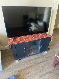Moving sale  TV stand/entertainment cabinet ($25) Dining set round table with 4 chairs ($30) One tall brown wood chair ($10)  One set of coffee table