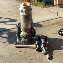 Dyson vacuum cleaner works perfect. Excellent condition. All the attachments include new model never lose section.