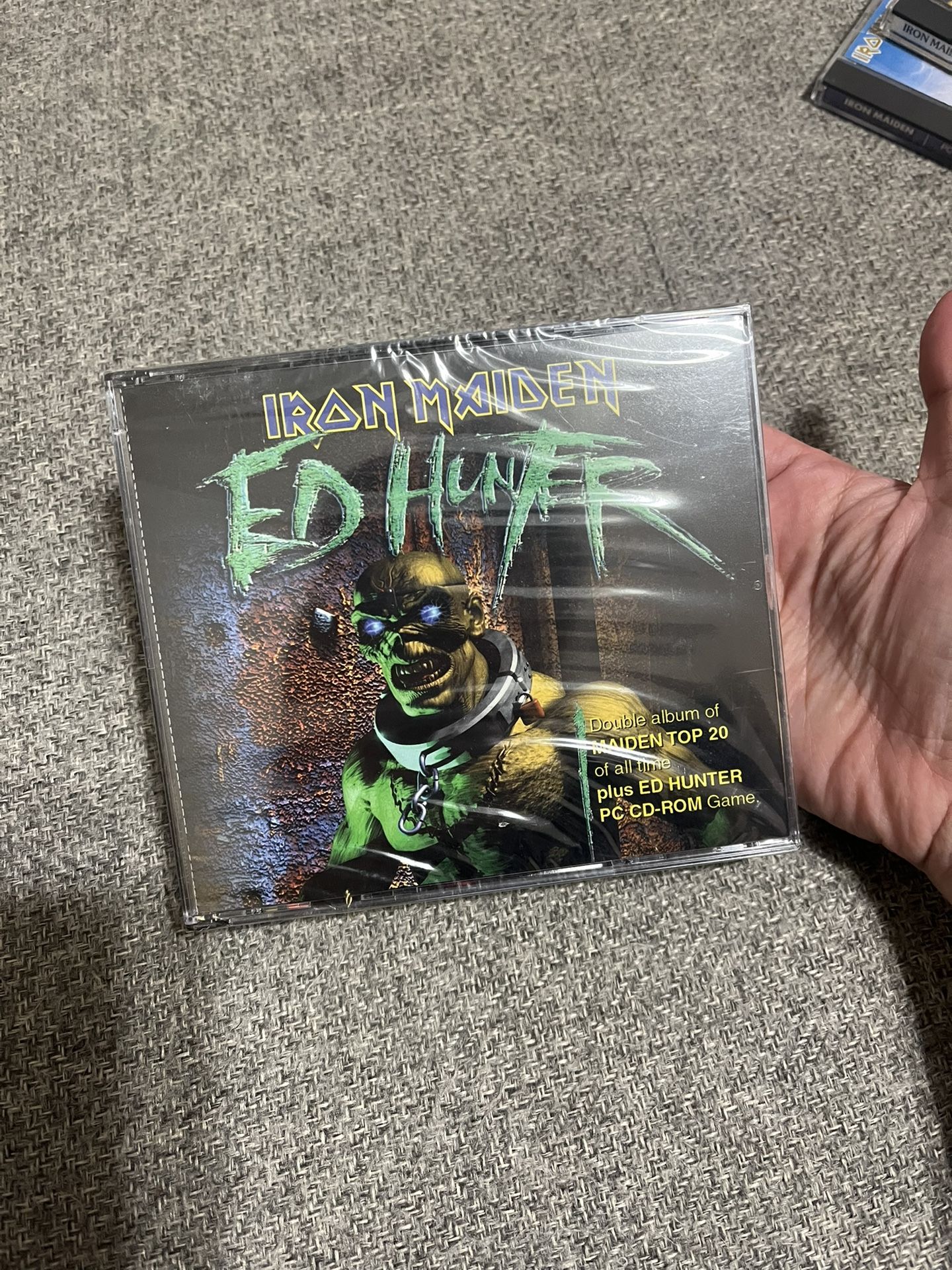 Selling this Sealed Iron Maiden Ed Hunter Cd Original plastic sealed is slightly ripped as seen in the picture
