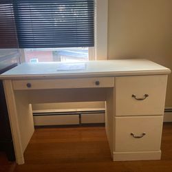 White Desk And Brown Dresser