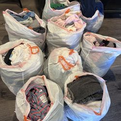 9 Bags Of Clothing Over 100 Pieces Mostly Women’s And Some Kids Great For Resale