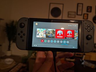 Nintendo switch W/ 128 GB SD card,  rune factory 4 special game card