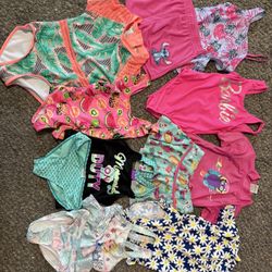 8 Swimsuits size 5-6 all in great condition!