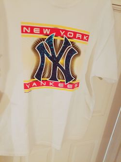 Vintage 1999 "NY Yankees" brand new white Tshirt with blue sequins. Discontinued.