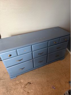 Dresser for sale. We have the knobs. They just need screws