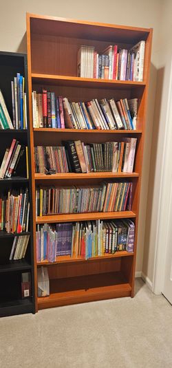 Two brown bookcases