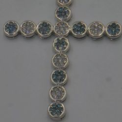 14kt white gold 17.8 grams pendant cross 3 inches long; white and blue diamonds ( approximately 3-3.25 carat ). 870139-1.