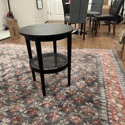 Black Round Side Table with Cane Shelf