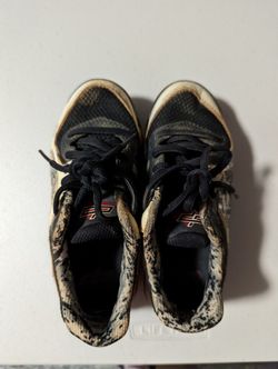 Black and white New Balance Youth Baseball Cleats