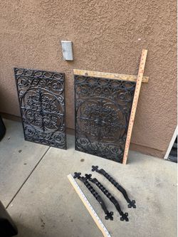 Decorative cast-iron handles and inserts