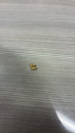 One singular gold and diamond link