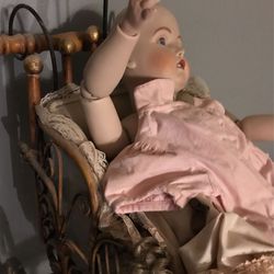 Antique Jointed Porcelain Doll With Carriage. 