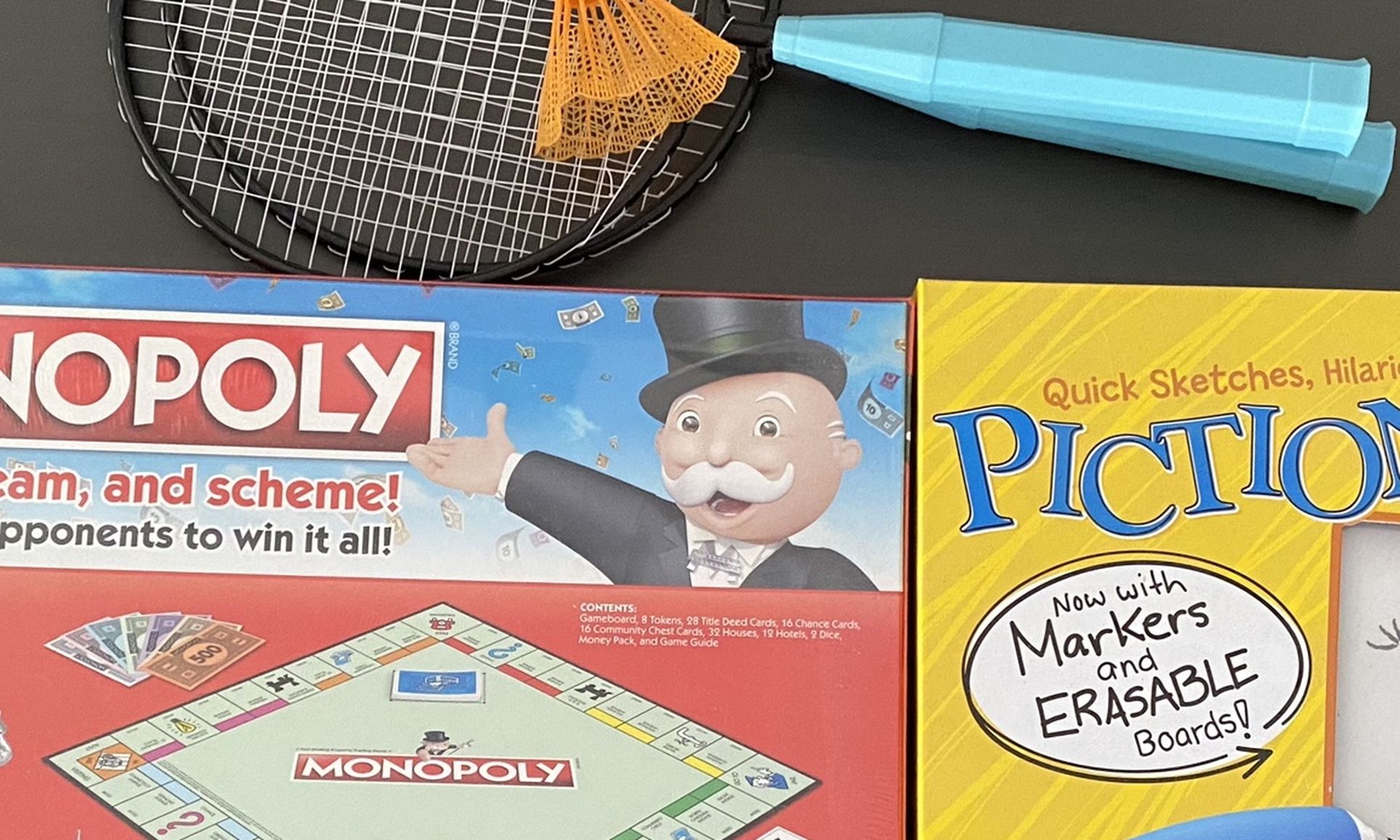 Unopened boxes of Board Games  & Badminton set