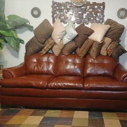 Wine/Burgundy 3 Seater Leather Couch, Picture And Pillows Too 