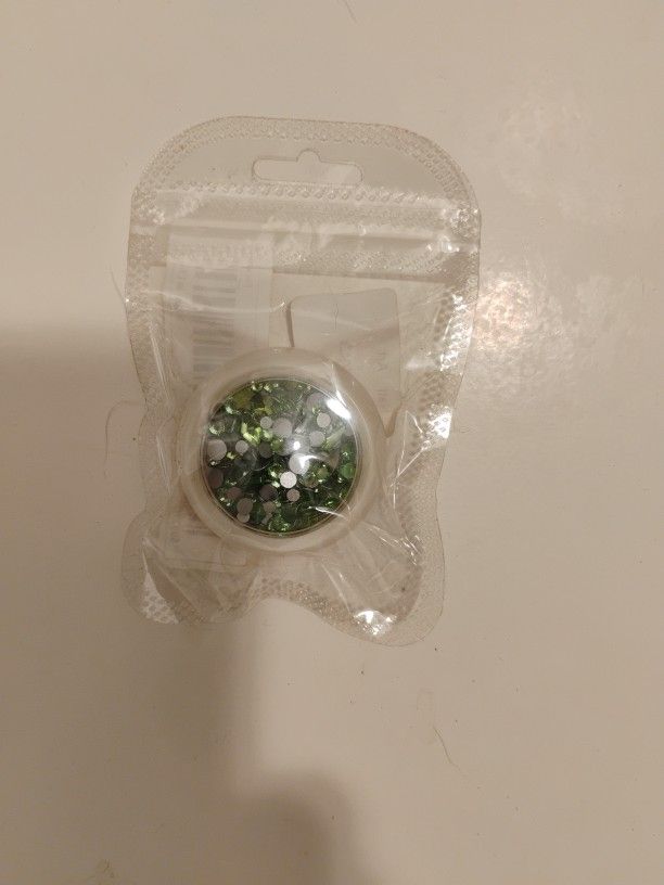 green nail art gems