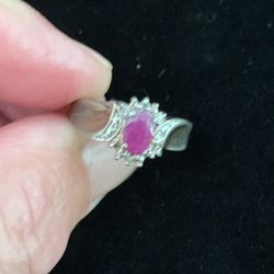 Beautiful Gold Colored Ring With Purplish Pink Stone And Clear Stone Halo