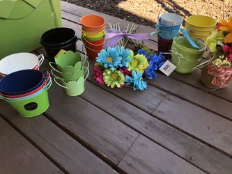 Colorful tins/flowers party supplies