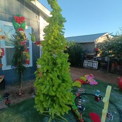 I need an office desk or a dog house willing to trade grinch tree lots of Grinch decorations included