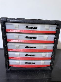 Snap on Used but in very good condition Five-Drawer Storage Cabinet • Use to store or inventory small tools and parts • Black, heavy-duty polypropyle